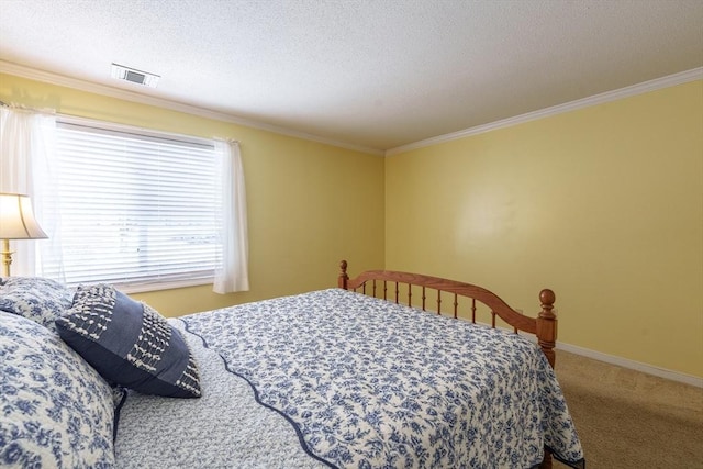 carpeted bedroom featuring a textured ceiling and ornamental molding