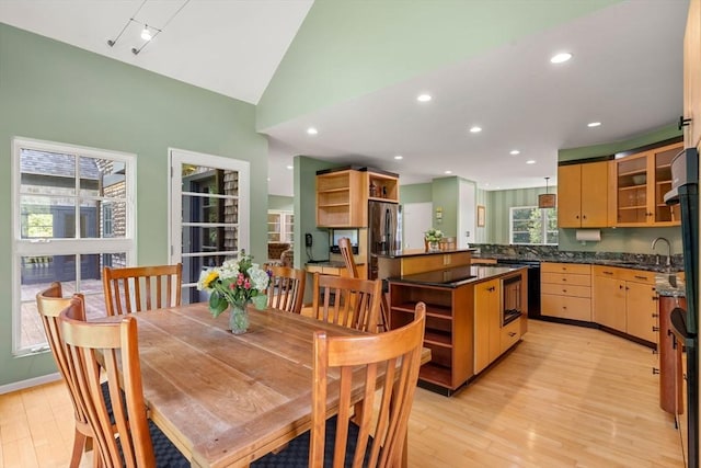 7 Penhollow Ln, Hampton Falls, NH 03844 - dining space featuring light wood-style flooring, vaulted ceiling, and recessed lighting