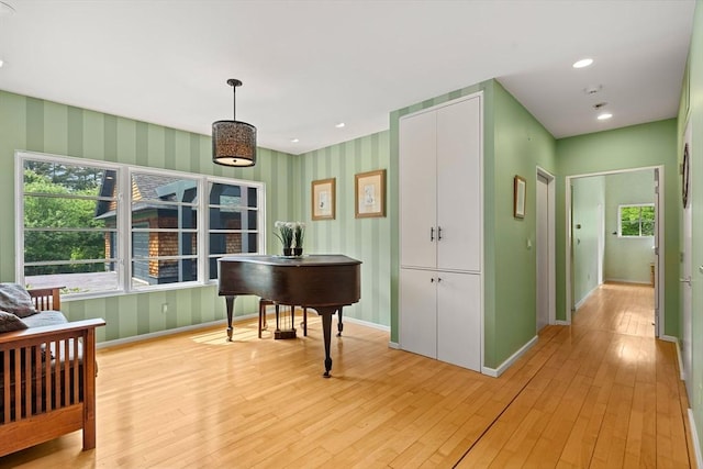 7 Penhollow Ln, Hampton Falls, NH 03844 - hallway featuring baseboards, light wood-style floors, and wallpapered walls
