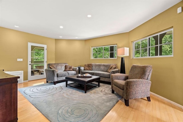 7 Penhollow Ln, Hampton Falls, NH 03844 - living room with wood finished floors, baseboards, and recessed lighting