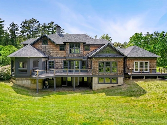 7 Penhollow Ln, Hampton Falls, NH 03844 - back of property with a deck, a chimney, and a lawn