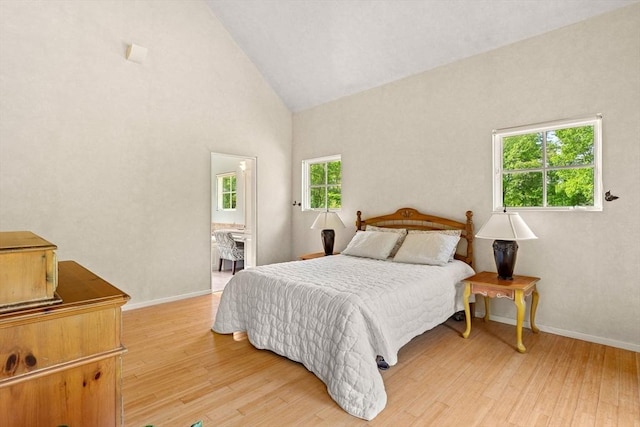 7 Penhollow Ln, Hampton Falls, NH 03844 - bedroom with light wood-style flooring, baseboards, and high vaulted ceiling