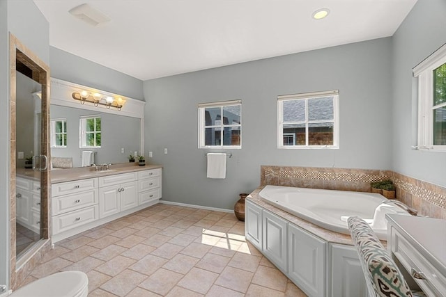 7 Penhollow Ln, Hampton Falls, NH 03844 - full bath with vanity, a bath, plenty of natural light, and baseboards