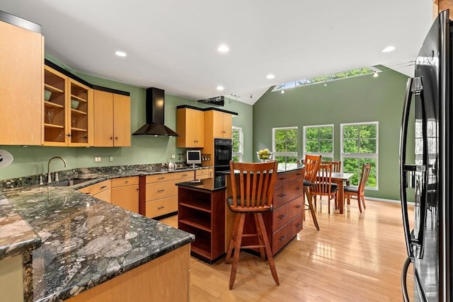 7 Penhollow Ln, Hampton Falls, NH 03844 - kitchen with wall chimney range hood, a sink, black appliances, open shelves, and light brown cabinets
