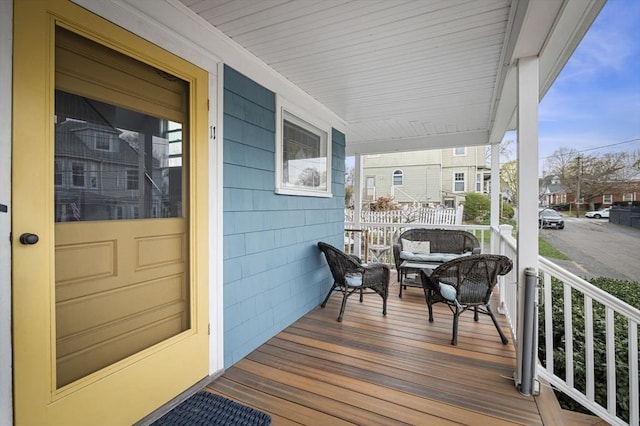 wooden deck featuring a porch