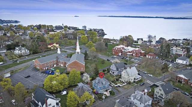 aerial view featuring a water view and a residential view