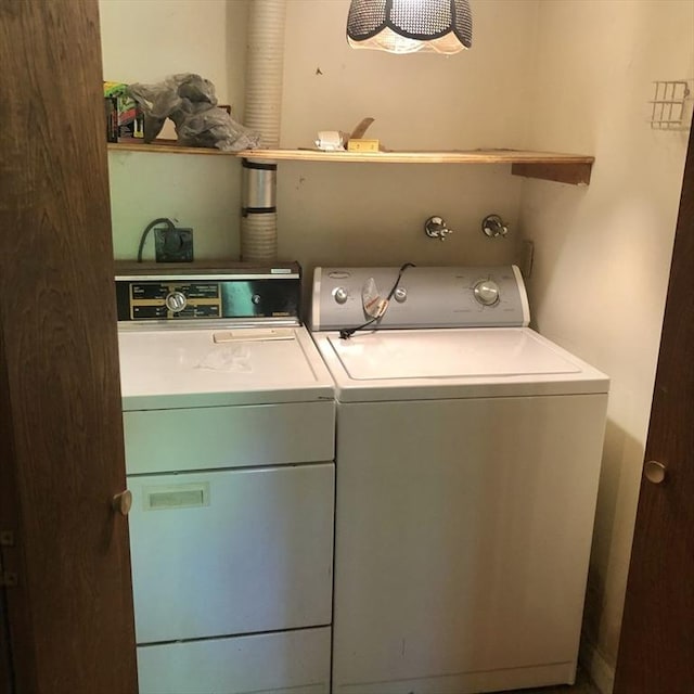 laundry room with washer and dryer