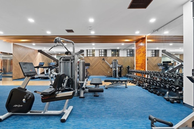 45 Temple St Unit 410, Boston, MA 02114 - exercise room with wooden walls, carpet, and visible vents