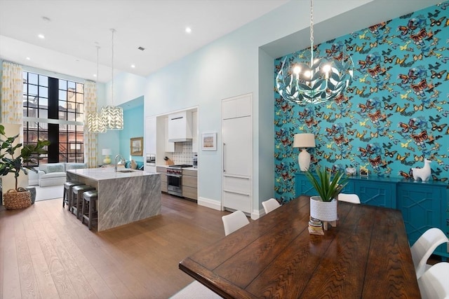 45 Temple St Unit 410, Boston, MA 02114 - dining area featuring recessed lighting, a high ceiling, a chandelier, and dark wood finished floors
