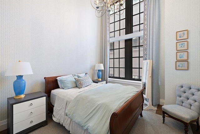 45 Temple St Unit 410, Boston, MA 02114 - bedroom featuring an inviting chandelier, baseboards, carpet floors, and wallpapered walls
