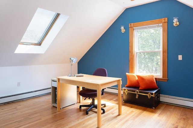 134 Brown St, Waltham, MA 02453 - office area featuring a skylight, light wood-type flooring, lofted ceiling, and a baseboard radiator