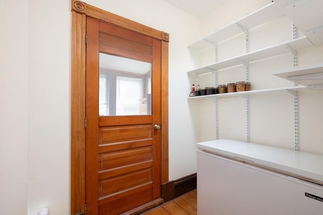 134 Brown St, Waltham, MA 02453 - doorway with light wood finished floors