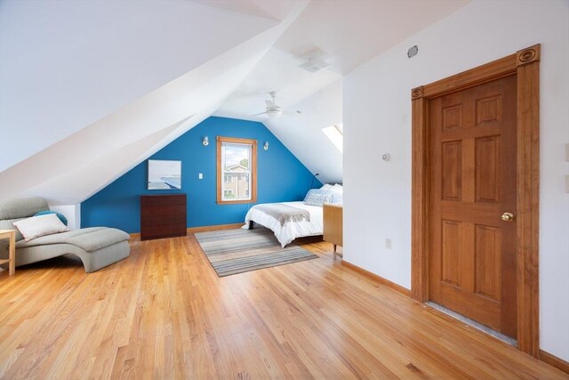 134 Brown St, Waltham, MA 02453 - bedroom with wood finished floors, baseboards, lofted ceiling, and a ceiling fan