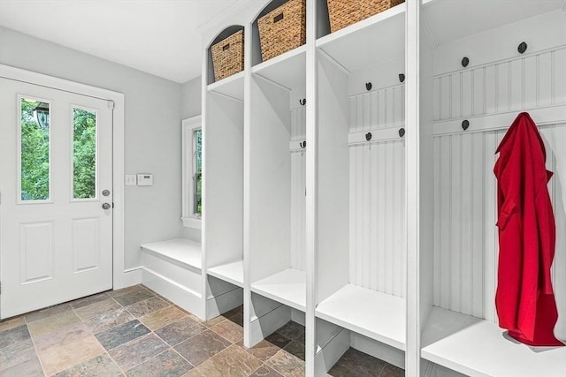 4 Worthen Rd, Winchester, MA 01890 - mudroom featuring stone tile flooring and baseboards