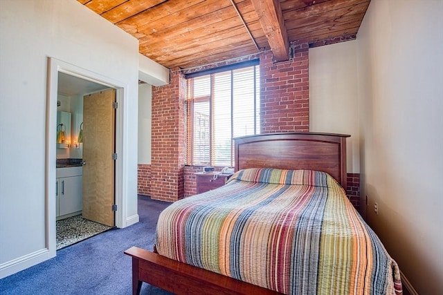 147 Centre St Unit 201, Brockton, MA 02302 - carpeted bedroom featuring wood ceiling with exposed beams, brick wall, baseboards, and connected bathroom