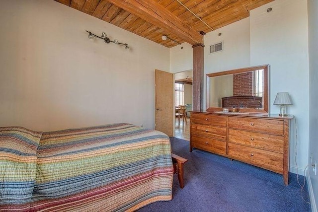 147 Centre St Unit 201, Brockton, MA 02302 - bedroom with wood ceiling and dark carpet