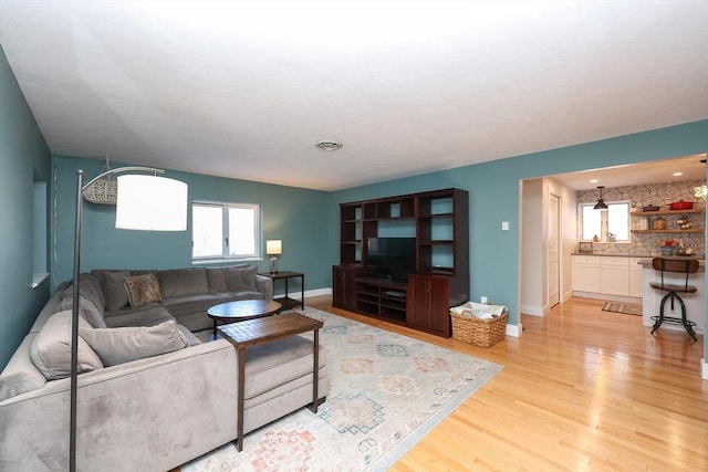 living room featuring light wood-type flooring