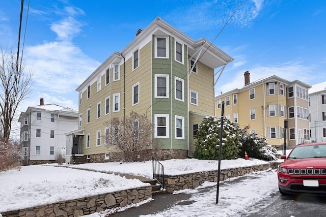 view of snow covered property