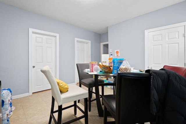 view of tiled dining space