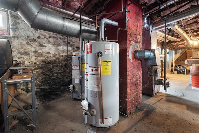 utility room with gas water heater