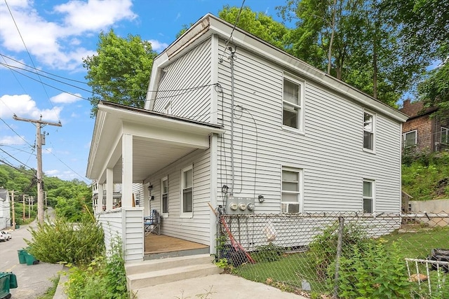 205-207 High St, Fitchburg, MA 01420 - view of home's exterior featuring covered porch
