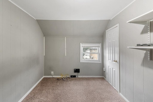 205-207 High St, Fitchburg, MA 01420 - additional living space with carpet floors, lofted ceiling, and wood walls