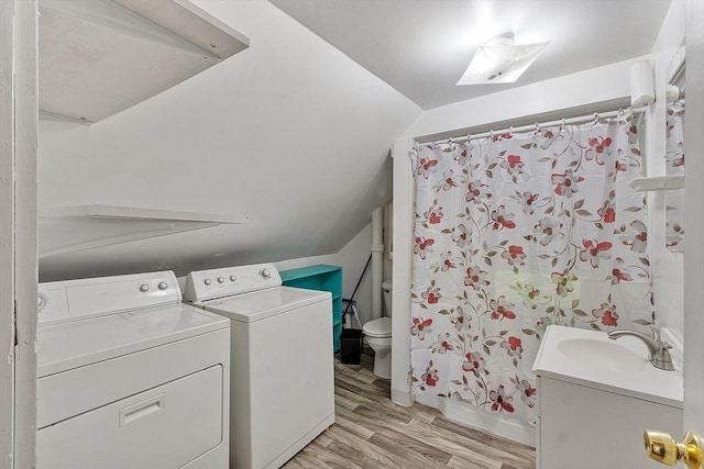 205-207 High St, Fitchburg, MA 01420 - laundry area featuring separate washer and dryer and light wood finished floors