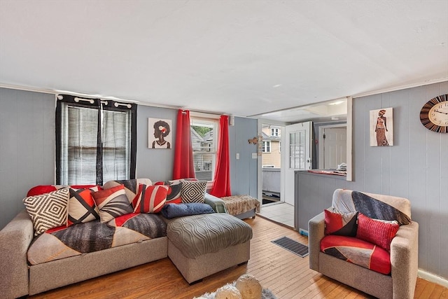 205-207 High St, Fitchburg, MA 01420 - living room with wood finished floors and wood walls