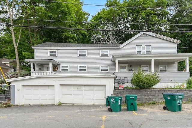 205-207 High St, Fitchburg, MA 01420 - view of front of home with a porch and an attached garage