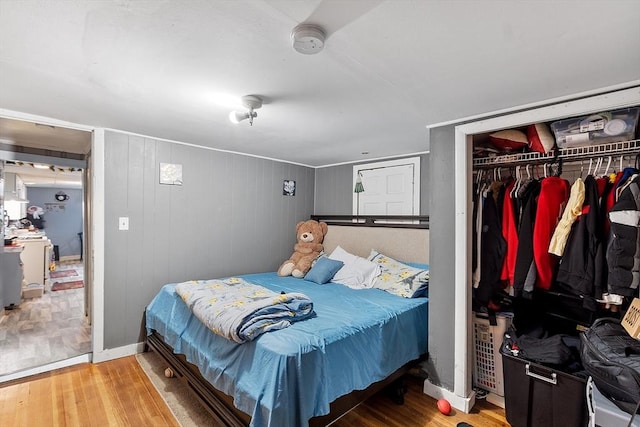 205-207 High St, Fitchburg, MA 01420 - bedroom featuring wood finished floors and a closet
