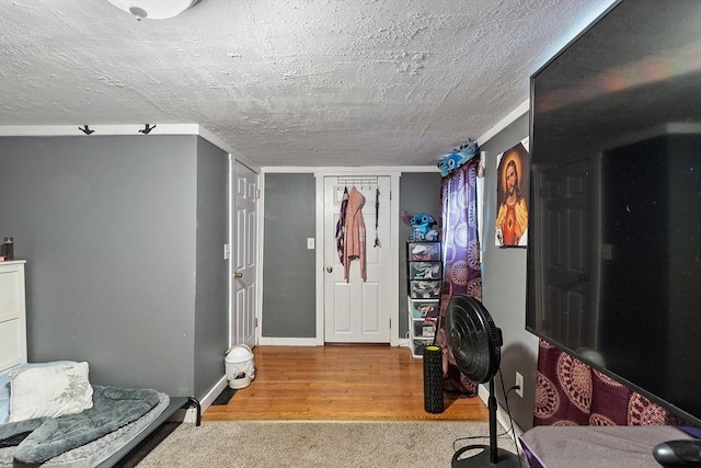 205-207 High St, Fitchburg, MA 01420 - office with a textured ceiling, wood finished floors, and carpet flooring