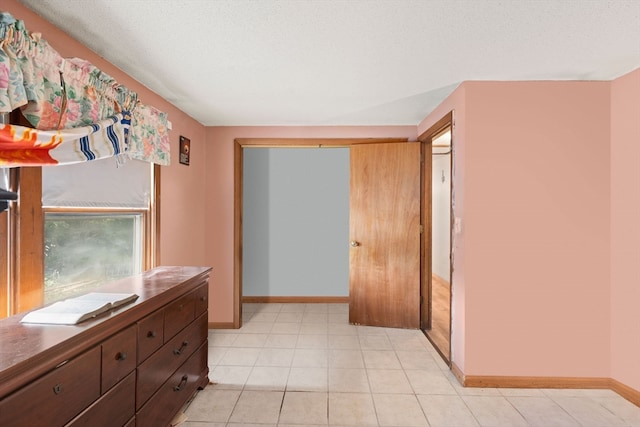 interior space with a textured ceiling