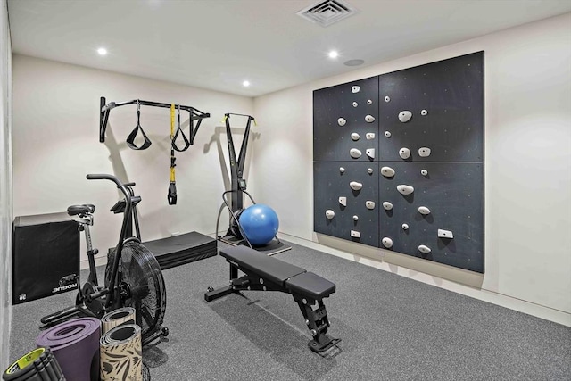 workout area featuring recessed lighting