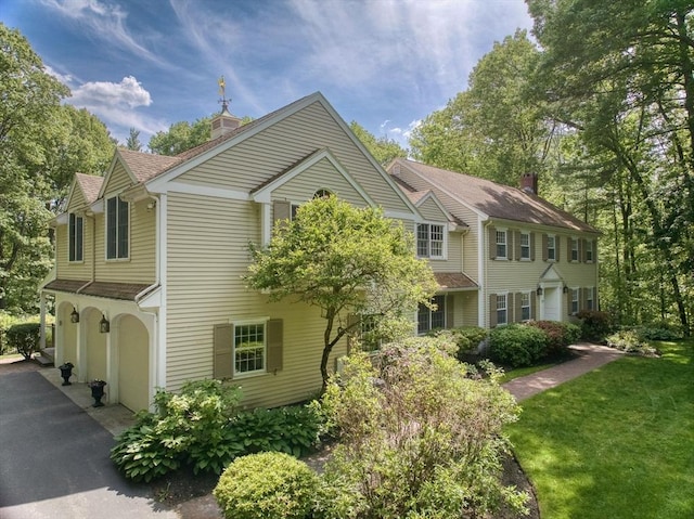 171 Brentwood Cir, North Andover, MA 01845 - view of front of property featuring roof with shingles and a chimney