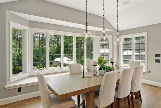 171 Brentwood Cir, North Andover, MA 01845 - dining room with lofted ceiling, baseboards, and wood finished floors