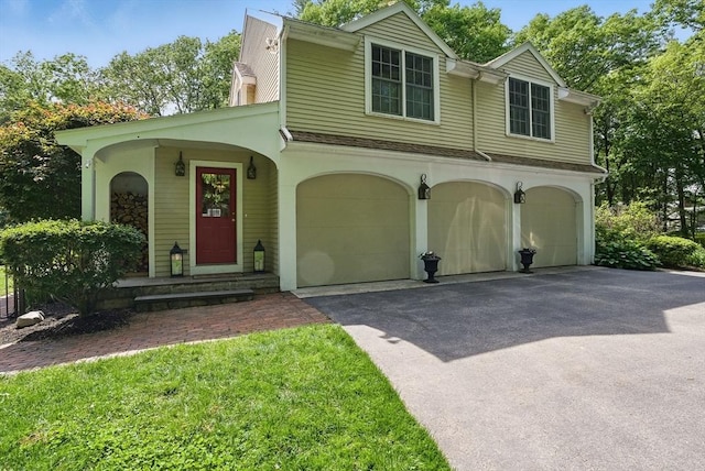 171 Brentwood Cir, North Andover, MA 01845 - view of front facade featuring a garage and driveway