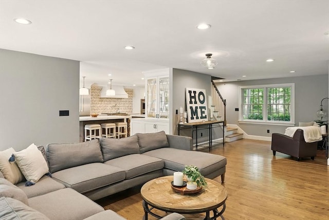 171 Brentwood Cir, North Andover, MA 01845 - living area featuring stairs, recessed lighting, light wood finished floors, and baseboards