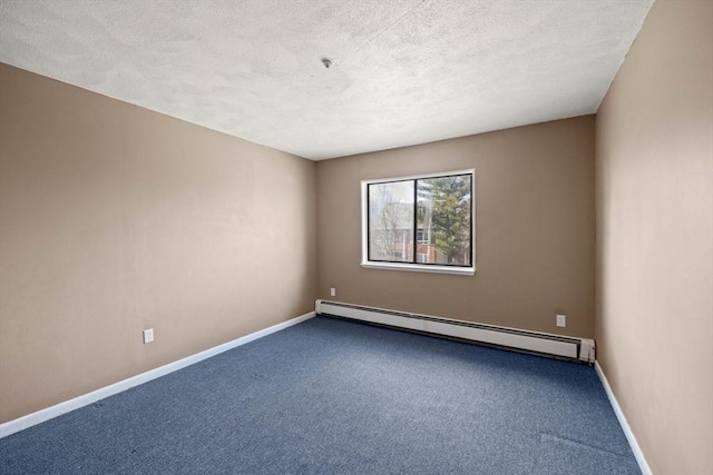 carpeted empty room with a textured ceiling and a baseboard radiator