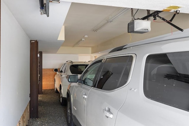 16 Ocean St Unit A, Salisbury, MA 01952 - garage featuring a garage door opener