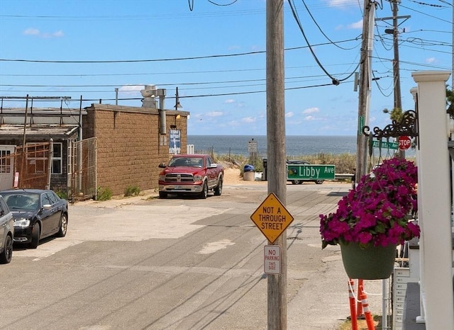 16 Ocean St Unit A, Salisbury, MA 01952 - view of asphalt street with traffic signs and a water view