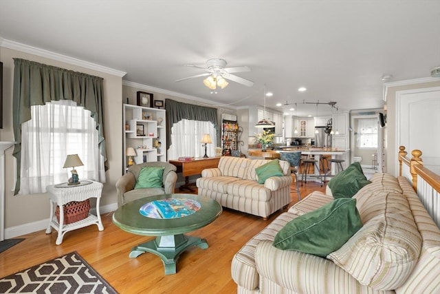 16 Ocean St Unit A, Salisbury, MA 01952 - living room featuring ceiling fan, crown molding, light wood-style flooring, and recessed lighting