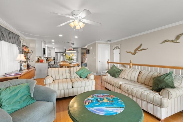 16 Ocean St Unit A, Salisbury, MA 01952 - living room featuring crown molding, a ceiling fan, light wood-style floors, and recessed lighting