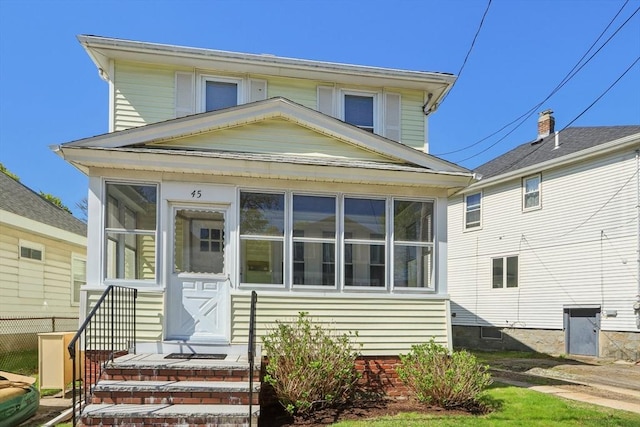 45 Franklin Ave, Quincy, MA 02170 - view of front of house with entry steps and a sunroom