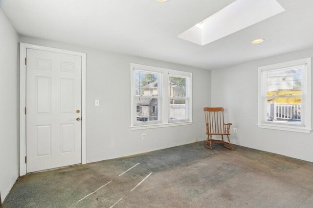 45 Franklin Ave, Quincy, MA 02170 - entrance foyer featuring carpet and a skylight