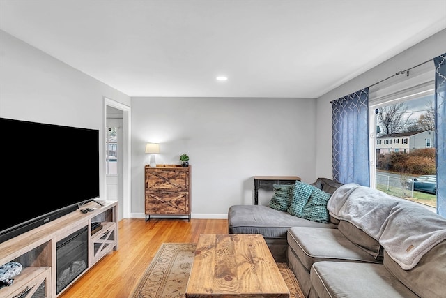 living room with light hardwood / wood-style floors