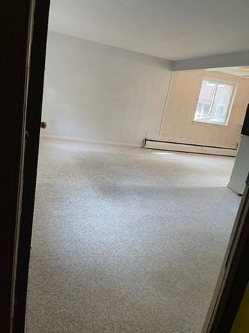 50 Wilson Dr Unit 50, Framingham, MA 01702 - unfurnished room with a baseboard heating unit
