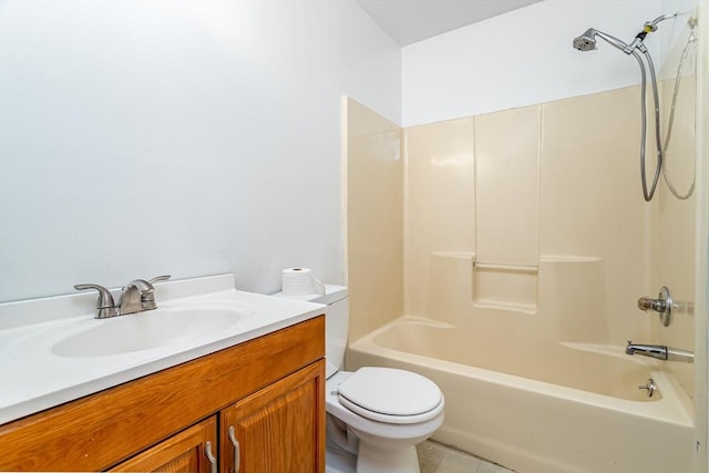 full bathroom featuring shower / bathing tub combination, vanity, and toilet