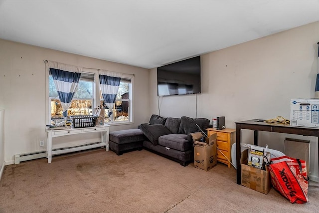 living area with light carpet and baseboard heating