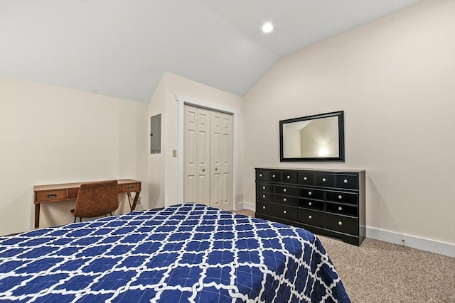 carpeted bedroom featuring a closet, electric panel, vaulted ceiling, and baseboards