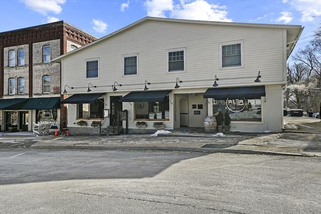 view of front of property with brick siding